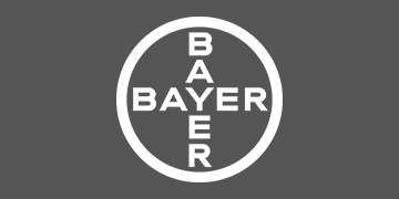 weisses "Bayer"-Logo auf grauem Hintergrund