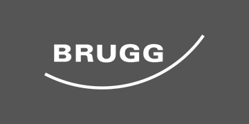 weisses "Brugg"-Logo auf grauem Hintergrund